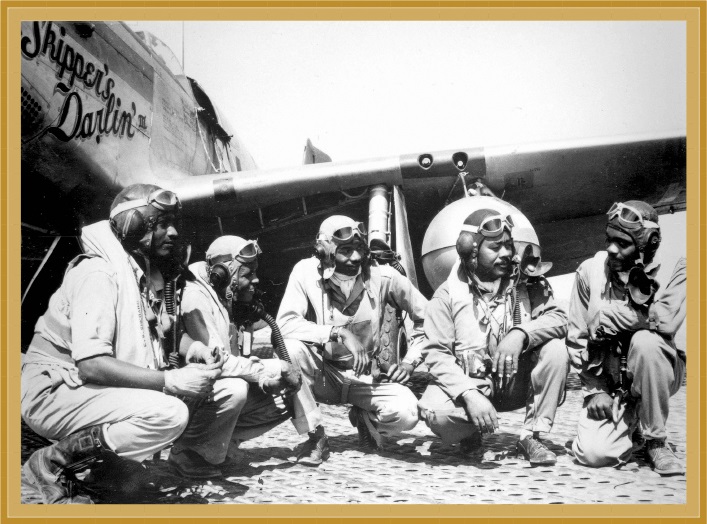 Pilots of the 100th Fighter Squadron 332nd Fighter Group (known as "Tuskegee Airmen") in front of P-51C Mustang at Ramitelli Airfield, Italy.