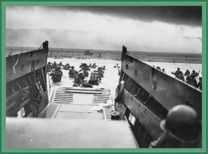 Coast Guard LCVP "Higgins Boat" unloads American troops at Omaha Beach during Normandy invasion on D-Day June 6, 1944.